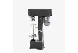 Máy đóng nắp chai loại có nắp chụp nhựa DK-50Z 1