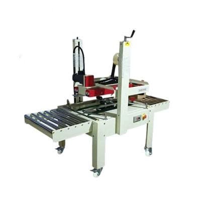 Máy dán băng keo thùng FXJ6050B